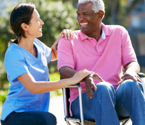 nurse and patient smiling at each other